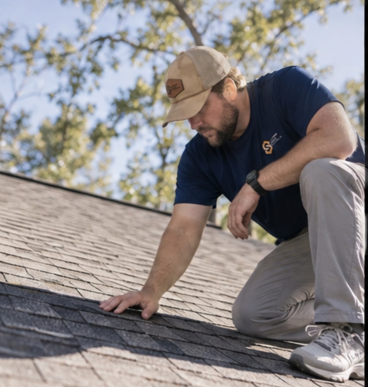 Boyce Yarbro inspecting the roofline of a Louisiana home